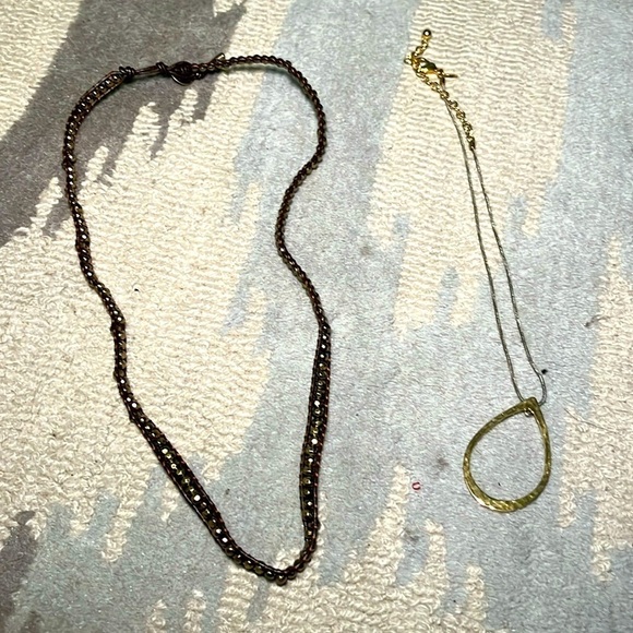 Set of two necklaces, one brown and one gold colored - Picture 1 of 7